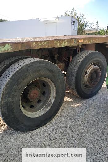 Used 1990 Iveco Turbostar 190-36 6X2 flatbed truck.