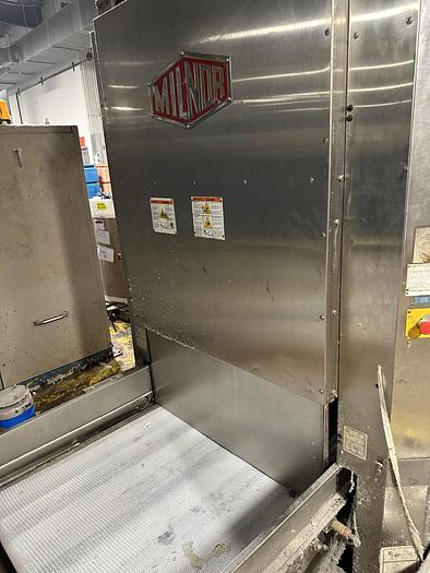 Used 2009 Milnor hydraulic extraction press