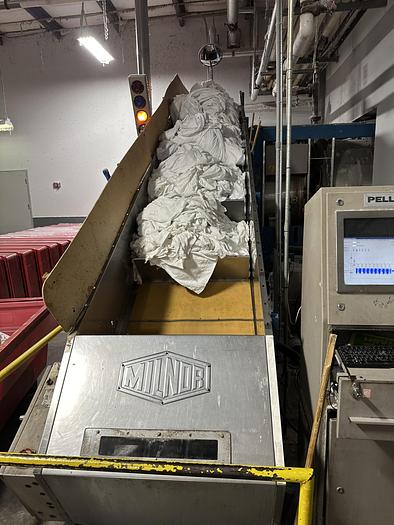 Used Milnor loading/weighing conveyor