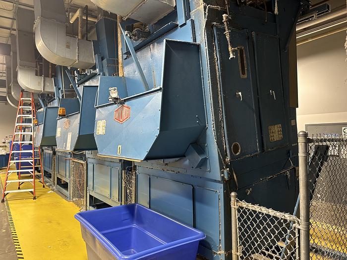 Used Milnor CBW system dryers (5 available) with Autolint
