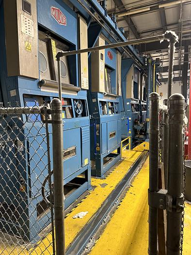 Used Milnor CBW system dryers (5 available) with Autolint