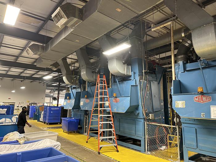 Used Milnor CBW system dryers (5 available) with Autolint