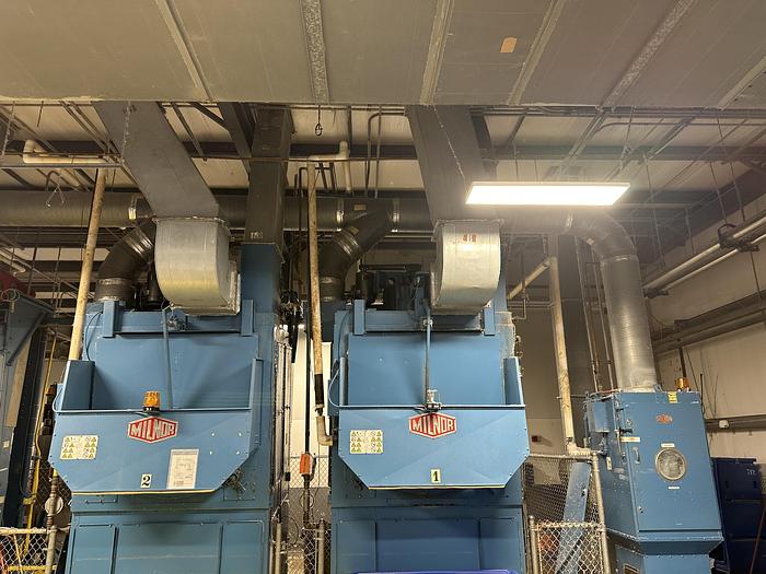 Used Milnor CBW system dryers (5 available) with Autolint