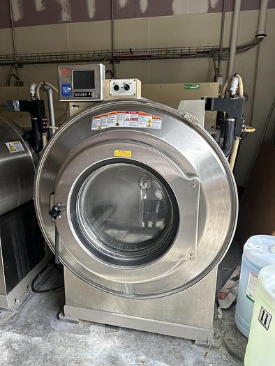Used Milnor 140lb washer extractors (5 available)