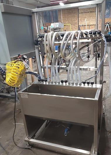 Used Liquid Packaging Solutions 8 Head Inline auto filler - pressure gravity