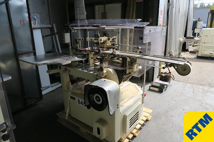 Used (2) Chocolate Bottom Fold Wrappers