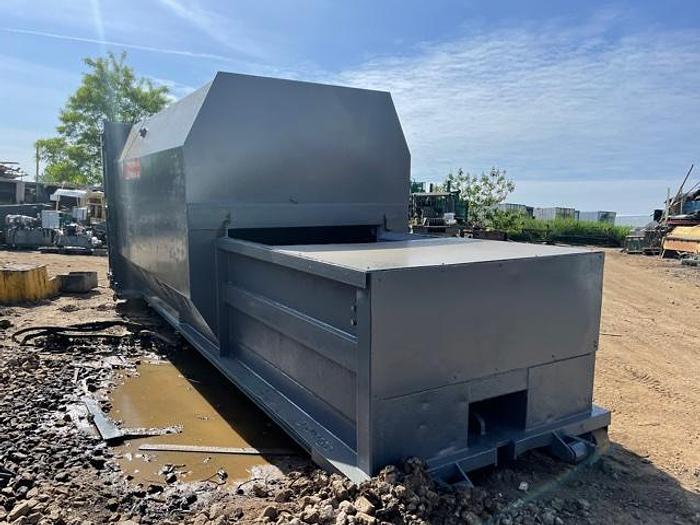 Used 20 yard PTR self contained compactor