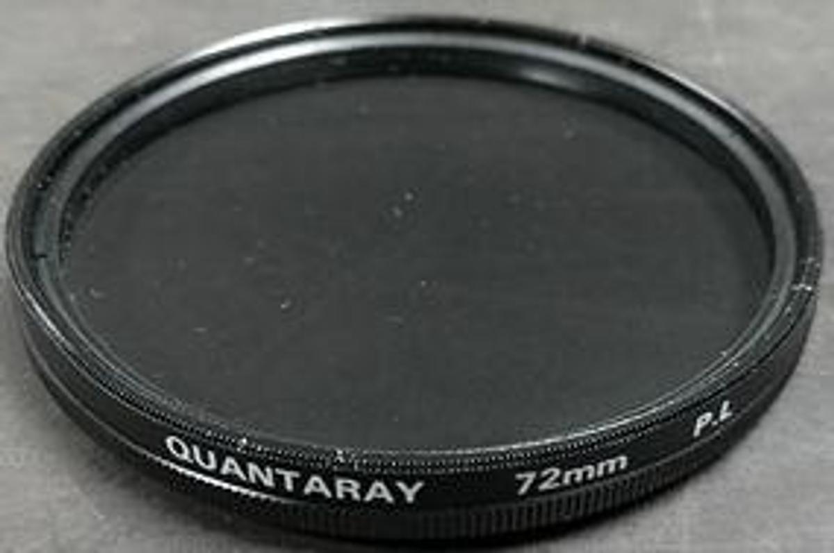 Used QUANTARAY 72MM P.L LENS JAPAN. THE QUANTARAY 72MM P.L IS A CIRCULAR POLARIZING FILTER (CPL) DESIGNED FOR CAMERA LENSES WITH A 72MM FRONT THREAD. ALTHOUGH "P.L" STANDS FOR POLARIZED