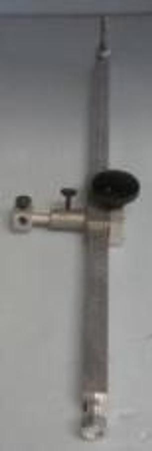 Used PRECISION STAND UP MEASURING GAUGE. 0-40. TWISTING KNOB RUNS GAUGE UP AND DOWN. HAS BOTTOM BOLT FOR ATTACHING.