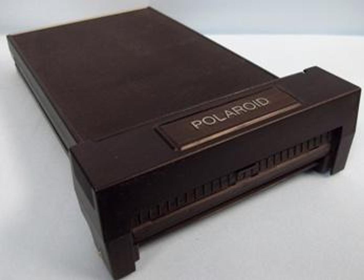 Used QTY. 1. POLAROID 545 LAND FILM HOLDER FOR CAMERA WITH 4X5 BACKS LEFT/RIGHT LOCKS WITH ORIGINAL BOX.