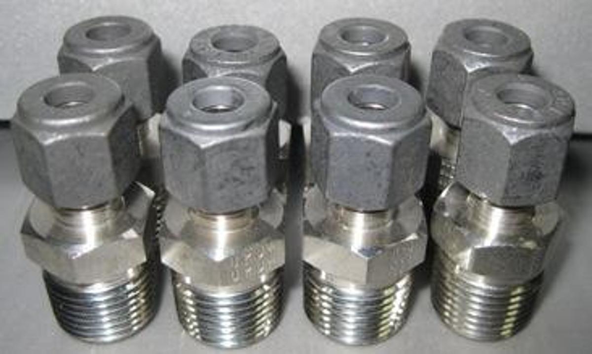 Used PARKER P 3/8" X ¼" 316 SS. TUBE X MNPT. .