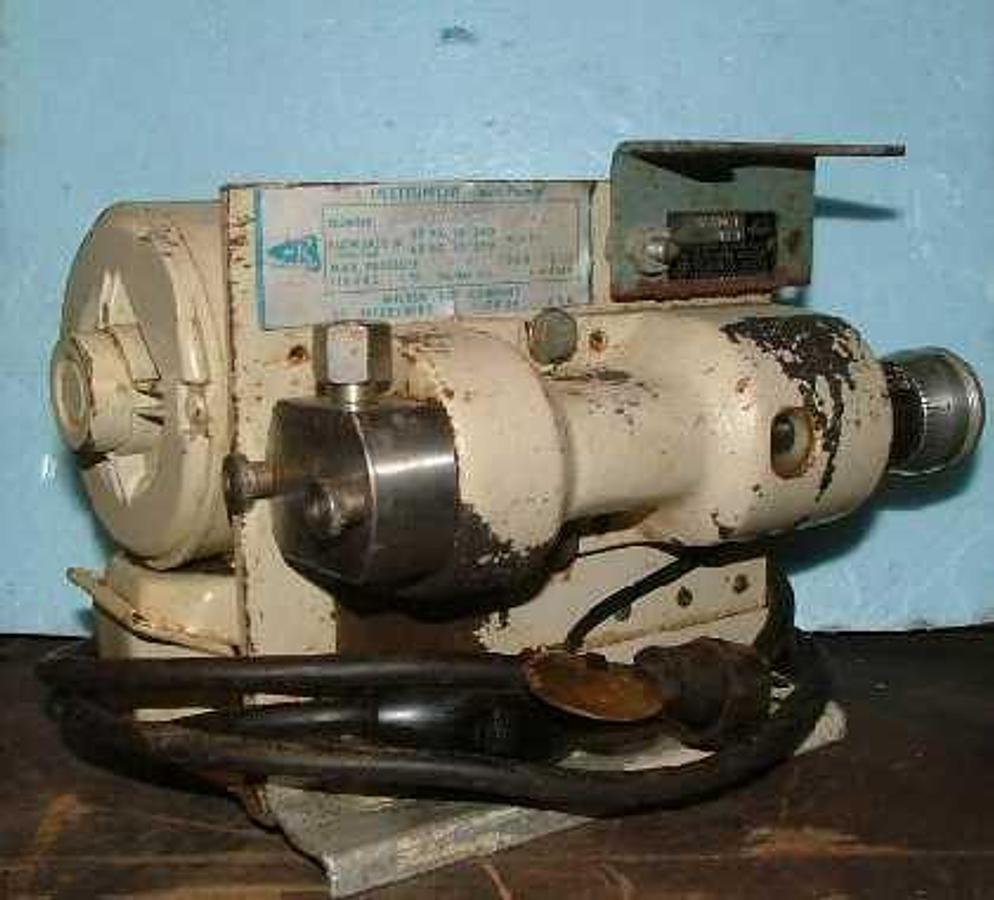 Used MILTON ROY COMPANY INSTRUMENT MINI PUMP MODEL: 196-0042-028 WITH GENERAL ELECTRIC MINA GEAR MOTOR. FLOW RATE: 29 TO 290 ML/HR.