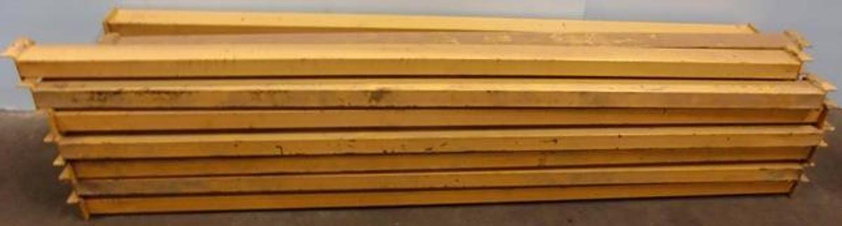 Used PALLET BEAMS 98 ¾" X 4 1/8" YELLOW L BRACKETT 2 SLOTTED HOLE 2 SQUARE HOLE 2 OPEN RECTANGULAR SLOT AT TOP OF BRACKETT BEND 1 SQUARE HOLE AT END.