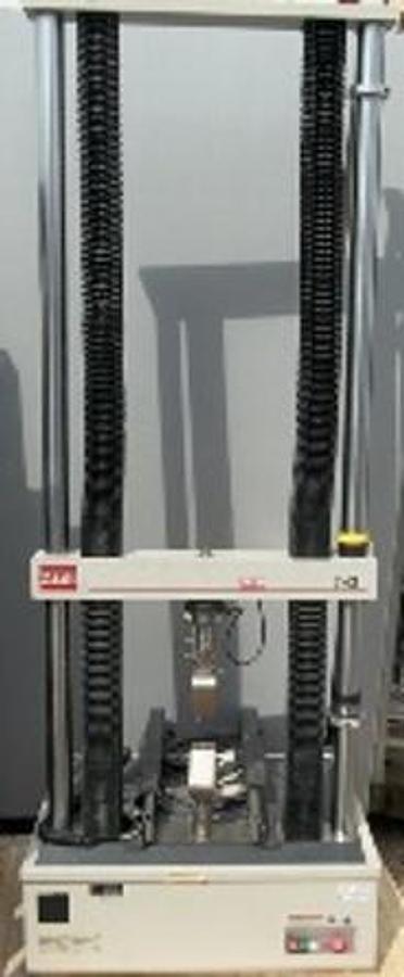 Used MTS 1/G TENSILE TESTER WITH WEDGE ACTION GRIPS AND HANDHELD CONTROLLER M/N: 4501030