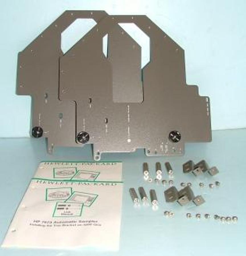 Used QTY. 1. HEWLETT PACKARD BRACKET PART NO 18597-60515 WITH MANUAL 2 BRACKET SUPPORTS 4 PAN HEAD SCREWS 3 STANDOFFS 1 TRAY BRACKET 3 PAN HEAD SCREWS 1 PAN HEAD SCREW FLAT HEAT SCREW