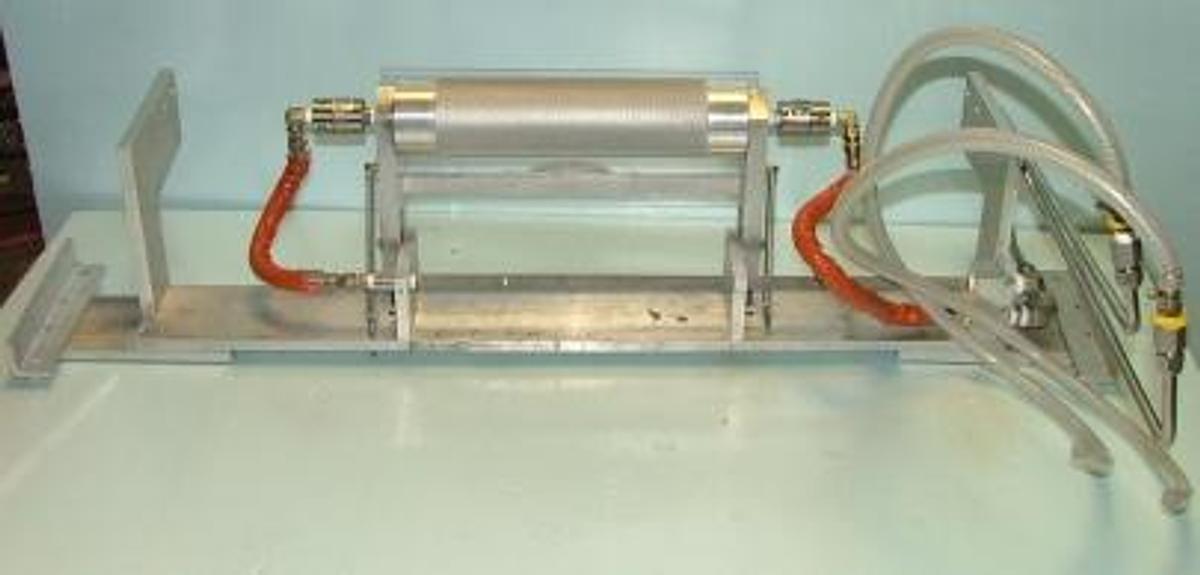 Used QTY. 1. SHEET ROLL APPRATUS 3" X 13" WITH HIGH PRESSURE ROTARY UNIONS. ALUMINUM CONSTRUCTION WITH PLEXIGLASS GUARD.