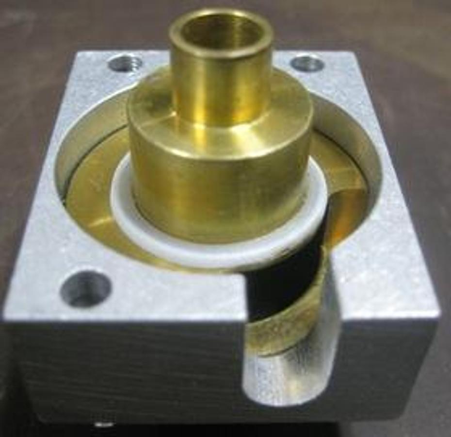 Used AGILENT TECHNOLOGIES 6890 FID COLLECTOR BRASS TOP WITH SPANNER RING AND ALUMINUM BLOCK.