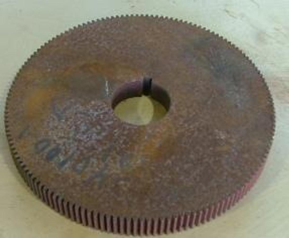 Used 144 TOOTH GEAR 7 3/8 DIAMETER ON 1 5/8 INCH DIAMETER SHAFT W/ KEY SLOT ¾ INCH THICK.