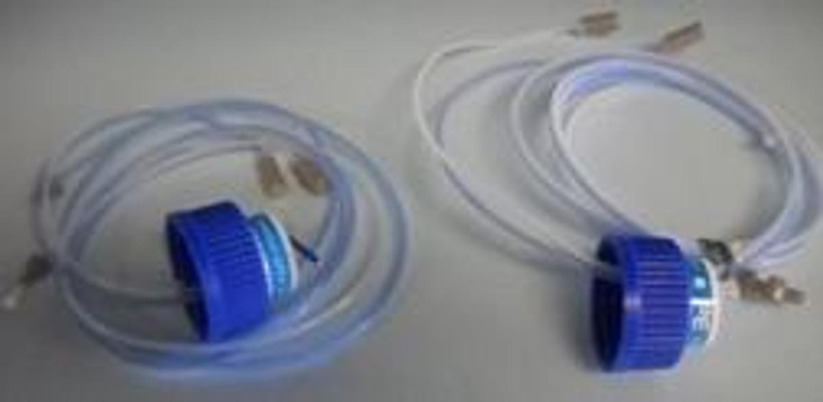 Used QTY. 2. PERKIN ELMER 2 LITER BOTTLE CAP KIT