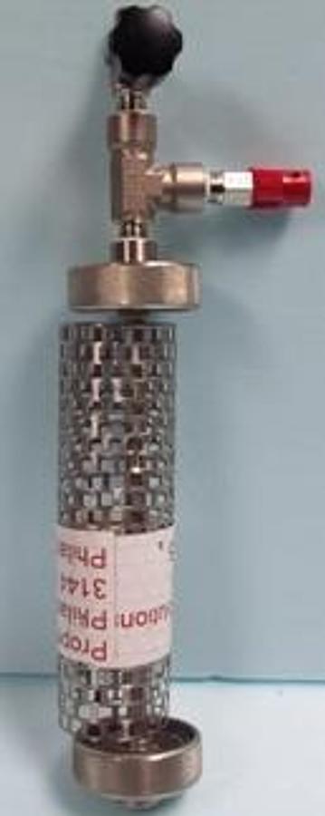 Used QTY. 1. STAINLESS STEEL PRESSURE VESSEL ENCLOSURE WITH 1. SWAGELOK SS-DKM4 VALVE WITH 1. SWAGELOK 316 PRESSURE RELIEF VALVE WITH 1. STAINLESS STEEL MESH SLEEVE.