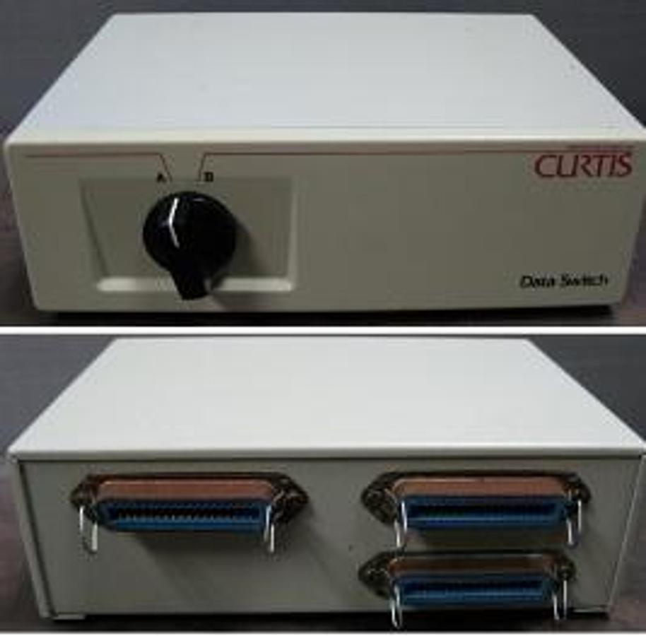 Used QTY. 1. MANUFACTURING COMPANY INC CURTIS DATA 2 CHANNEL SWITCH. 25 PIN SERIAL DATA SWITCHER A/B. AB 2 WAY SWITCH BOX
