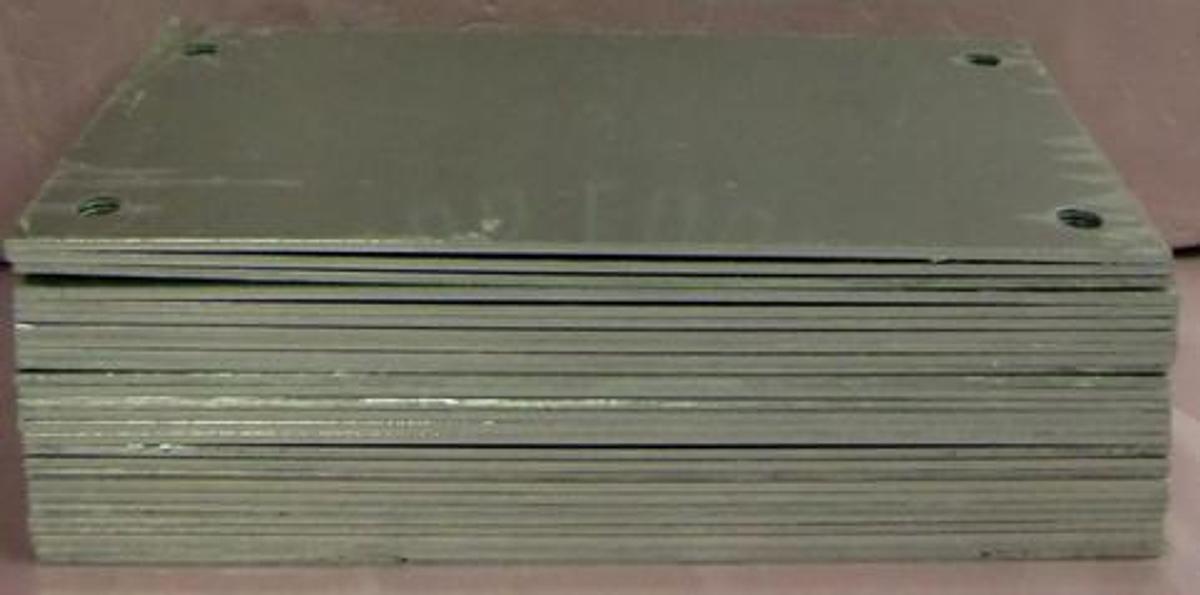 Used QTY. 27. 6" X 12" X 1/8" ALUMINUM PLATES WITH ½" I.D. HOLES PUNCHED AT EACH CORNER NEW CONDITION WRAPPED IN ORIGINAL PLASTIC.