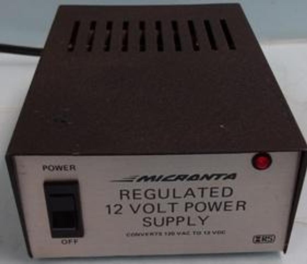 Used MICRONTA REGULATED 12 VOLT POWER SUPPLY CONVERTS 120 VAC TO VDC CAT. NO. 22-124 120 VAC 60 HZ 60 WATTS MAX. OUTPUT 13.8 VDC-2.5 A UL POWER SUPPLY LISTED.