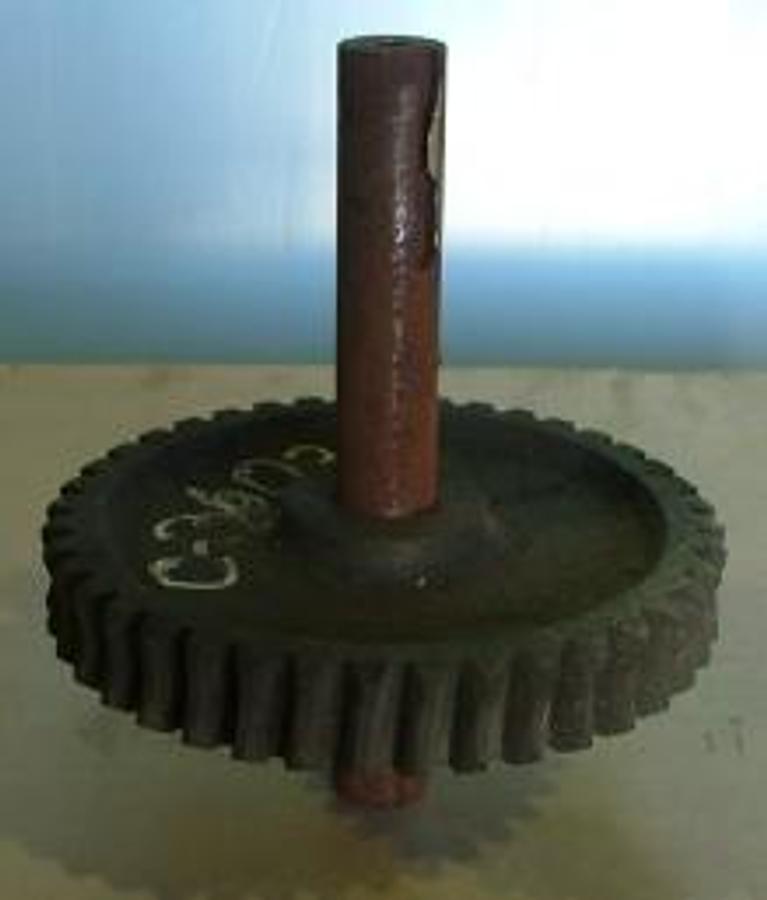 Used QTY. 1. 9 INCH DIAMETER 40 TOOTH GEAR ON KEYED 1 ¼ INCH DIAMETER SHAFT 9 INCHES LONG C-3603 409-95400-2.