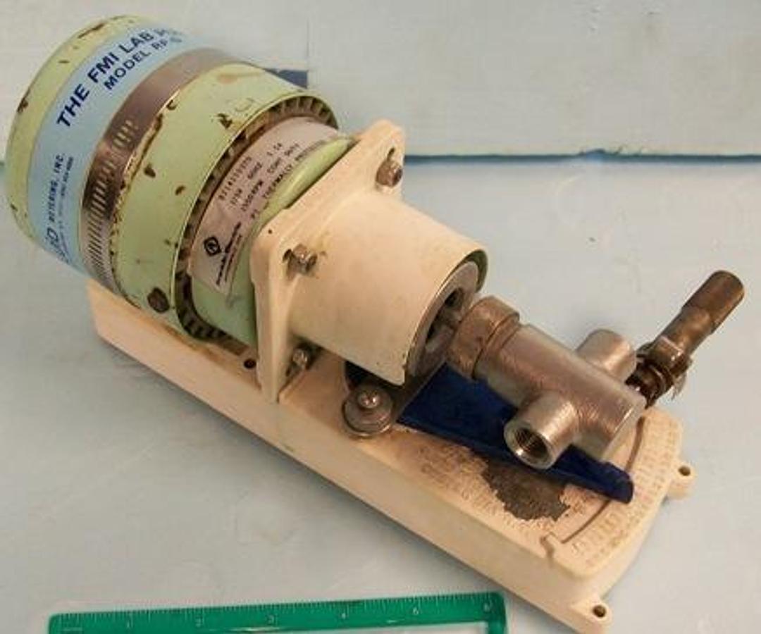 Used FLUID METERING INC