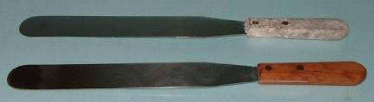 Used QTY. 2. 12" STAINLESS STEEL SPATULAS