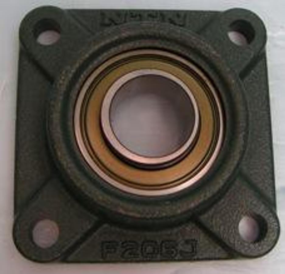 Used QTY. 1. NTN FLANGE BEARING 4 BOLT 1 ¼" BEARINGS ON 4 BOLT SQUARE MOUNTING PLATE 4 ¼" X 4 ¼" X 1 ¼"