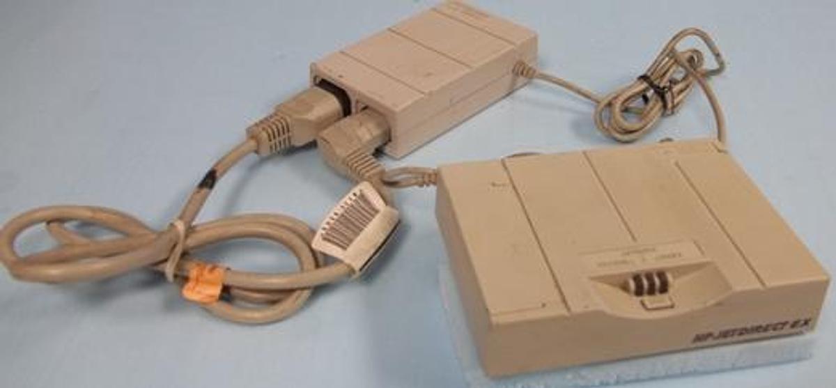 Used QTY. 1. HP JET DRIVE EX # J2382B WITH AC/DC ADAPTER P/N: 0950-2372 100-240V 60HZ 5 WATTS.