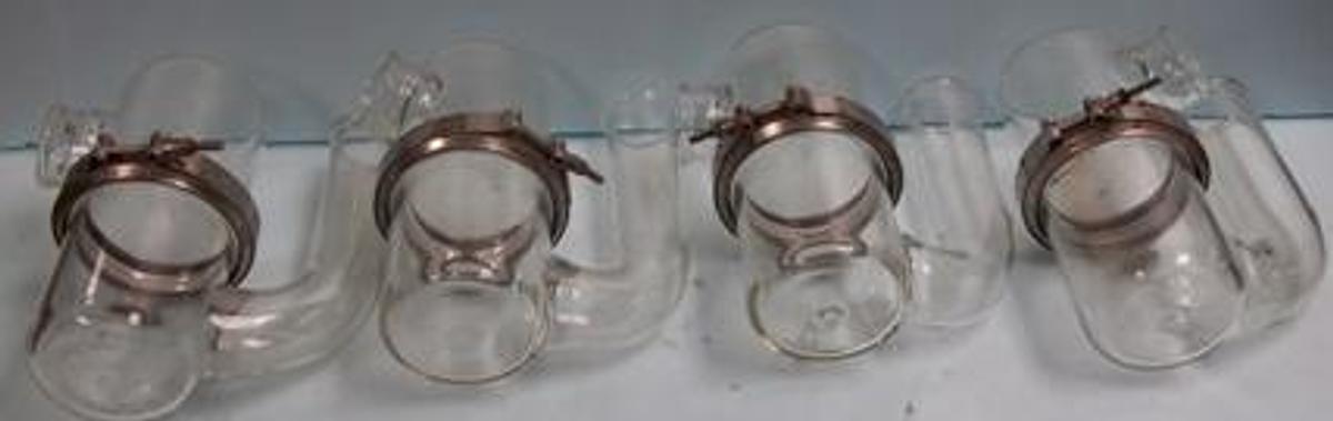 Used PYREX GLASS 2" INLET GLASS PIPE WITH 4" BOWL AND 2" OUTLET BEADED ENDS.