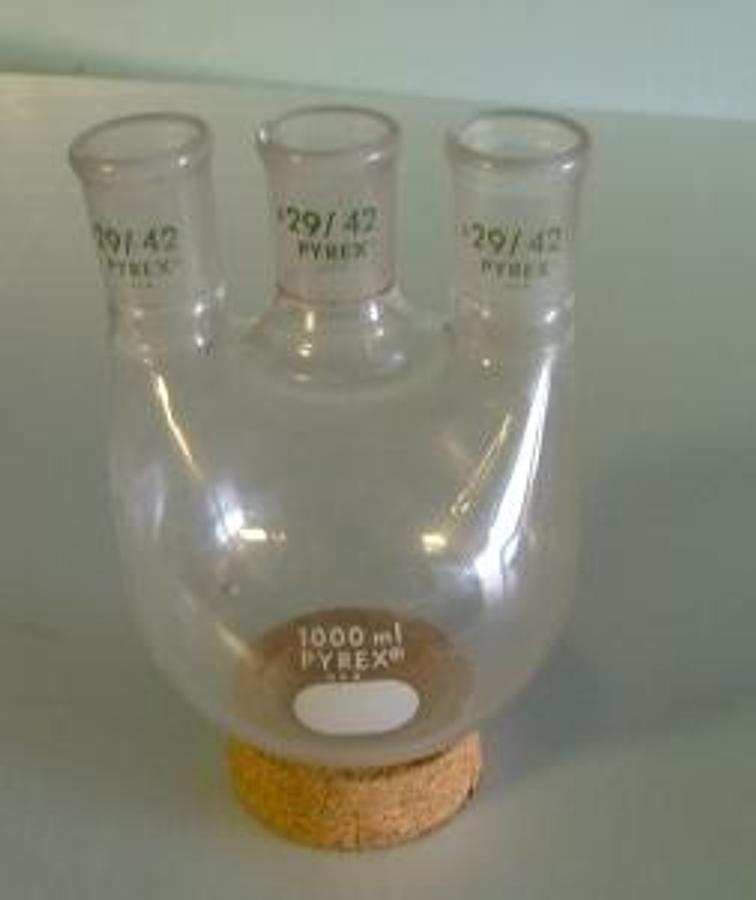 Used QTY. 1. PYREX 1000 ML ROUND BOTTOM THREE NECK BOILING FLASK