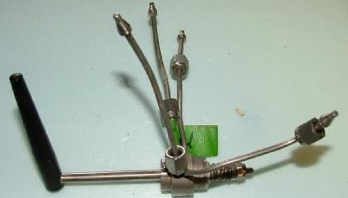 Used QTY. 1. VICI VALVE 4 PORT WITH FITTINGS AND HANDLE