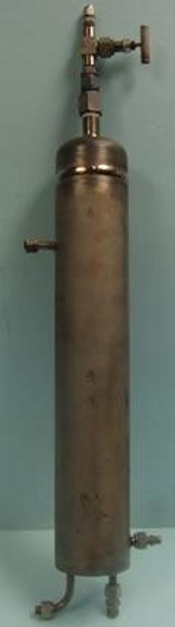 Used TITANIUM PRESSURE VESSEL LENGTH 20" DIA. 3 ½" TOP INLET ½" BOTTOM 2. OUTLET 3/8" TOP SIDE OUTLET 3/8" BOTTOM SIDE 3/8" EC ASMI SB 337 GR 2 AST WITH WHITEY TI-3NRF4 NEEDLE VALVE.