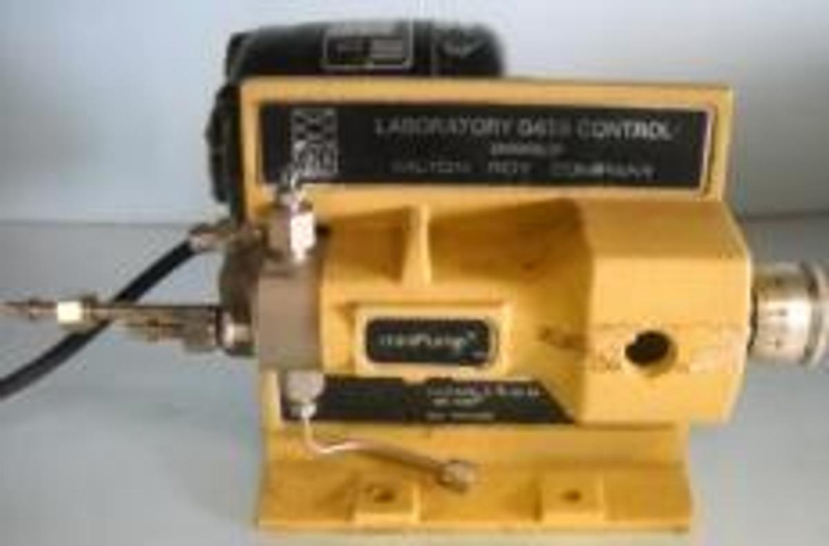 Used LABORATORY DATA CONTROL DIVISION OF MILTON ROY COMPANY. MINI PUMP