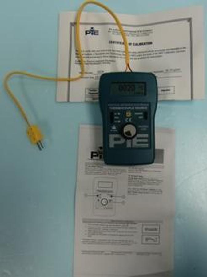 Used QTY. 1. PIE (PRATICAL INSTRUMENTS ELECTRONICS) THERMOCOUPLE SOURCE MODEL NO. K 520 EZ-DIAL THERMAL COUPLE / INSTRUMENT CALIBRATOR. SRN. 107217 WITH 1. PIE MODEL 520/521 OPERATING INSTRUCTIONS WITH 1. PIE MODEL K 520 CERTIFICATE OF CALIBRATION. (NEW).