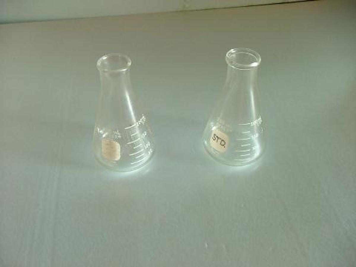 Used PYREX 250 ML ERLENMEYER FLASKS NO. 4980 USES STOPPER NO. 6. .