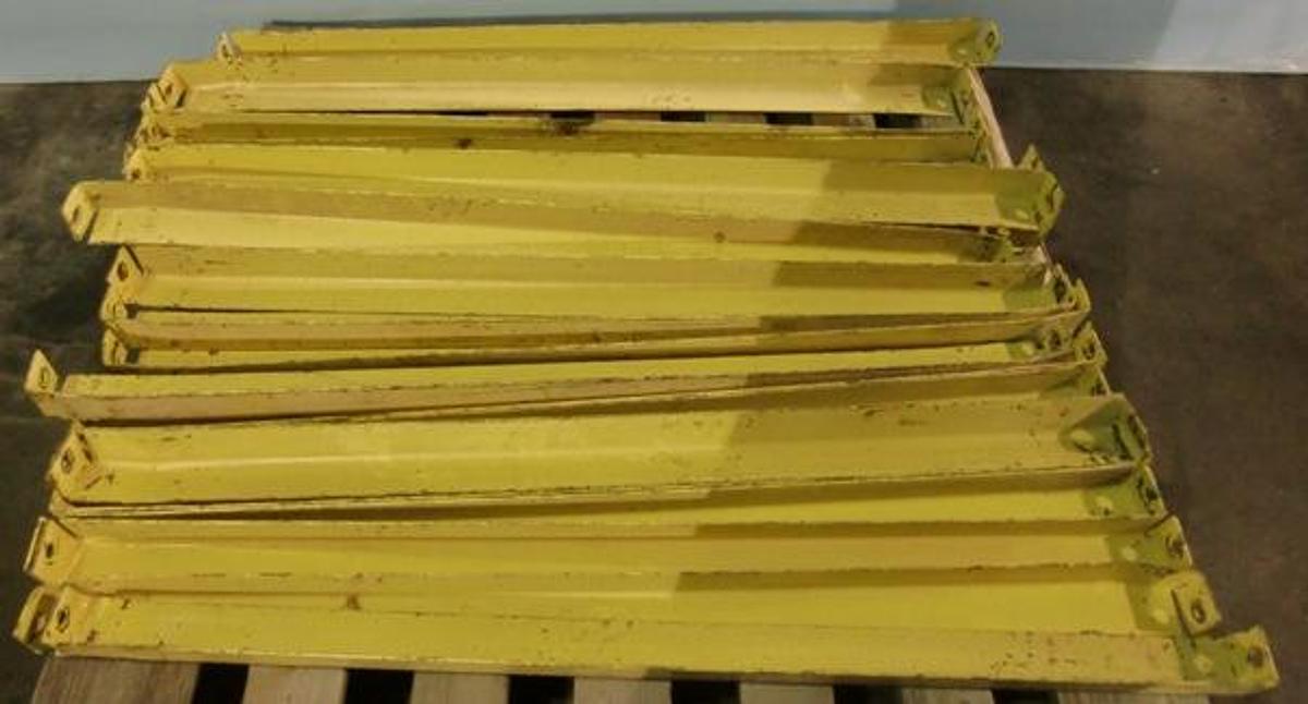 Used QTY. 21. PALLET RACK SUPPORTS 42" X 2" X 2" YELLOW 2. ROUND HOLE INVENTORY RACK PALLET SUPPORT BRACE.