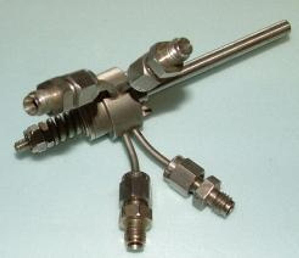 Used VALCO VICI VALVE 4 PORT WITH FITTING.