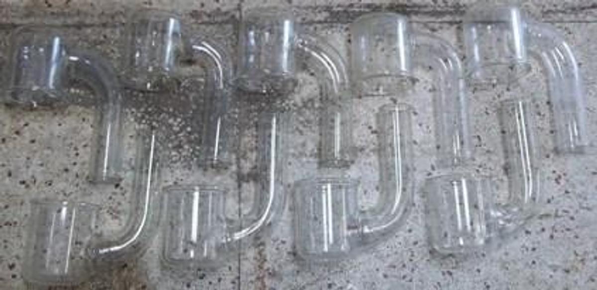 Used QTY. 9. PYREX GLASS 2" GLASS PIPE WITH 4" X 5 ¼" BOWL BEADED ENDS.