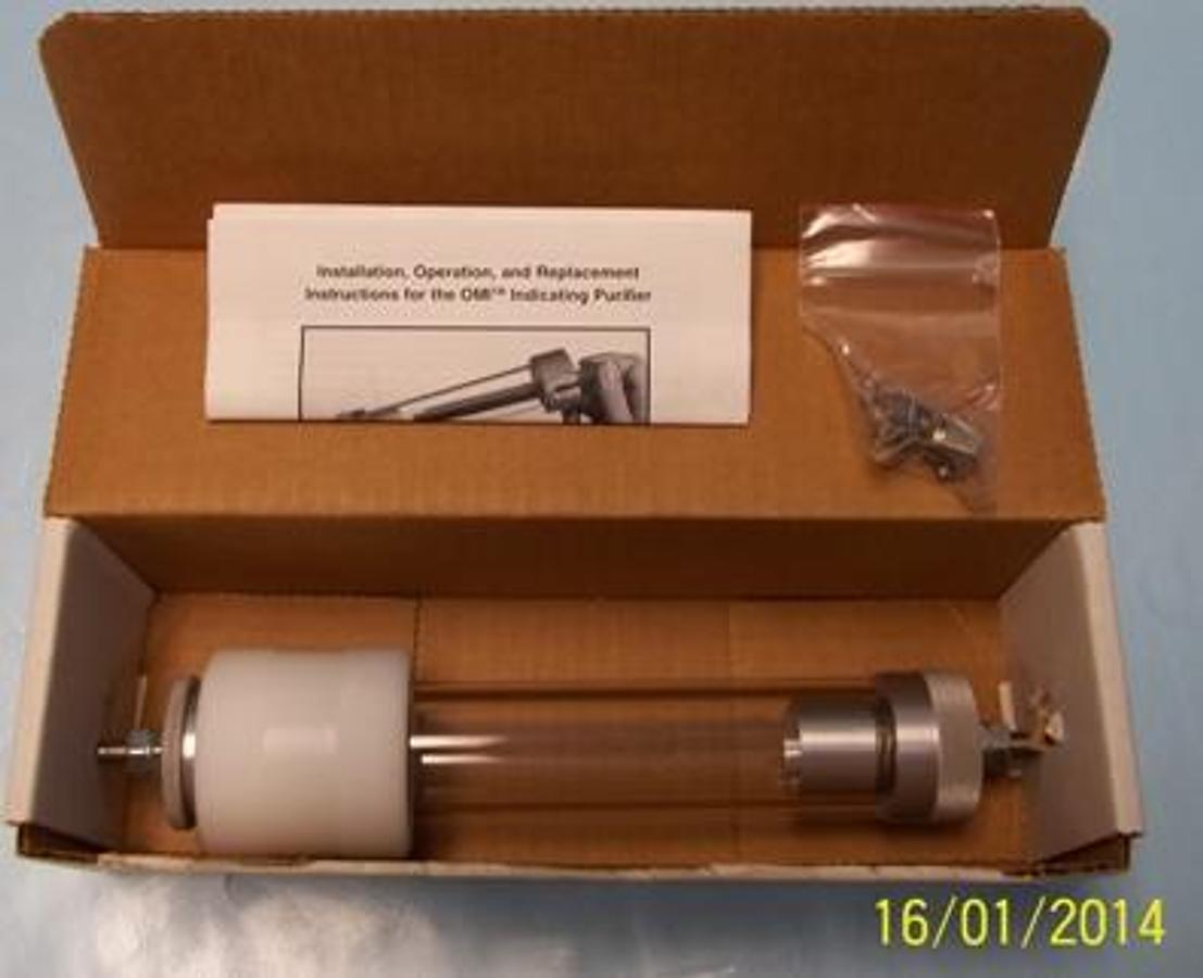 Used SUPLECO DMI INDICATING PURIFIER 0797 TUBE HOLDER COMES WITH SPARE BOLTS AND BOX.