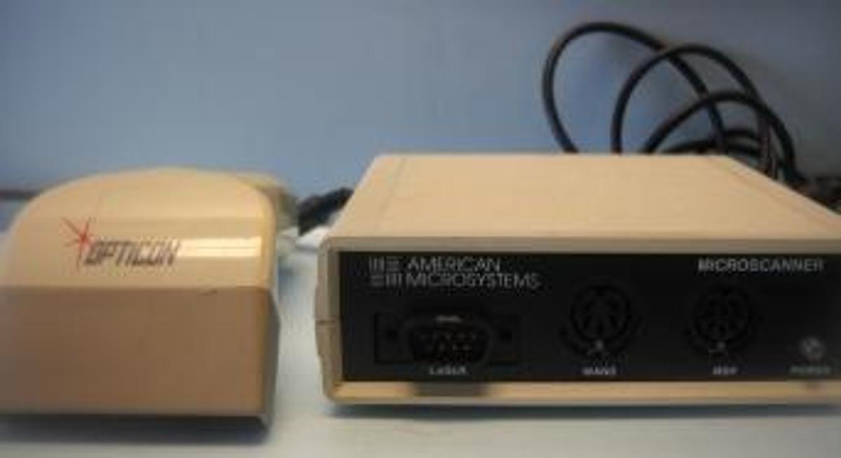 Used AMERICAN MICROSYSTEMS MICRO SCANNER RS-23Z SERIAL PORT WITH OPTICON LASER SCANNER.