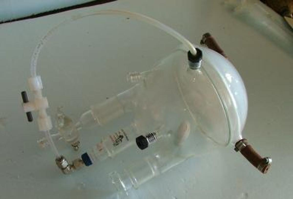 Used QTY. 1. SPECIAL 29/42 THREE NECK ROUND BOTTOM BOILING FLASK WITH BUILT IN STIRRING BAR.