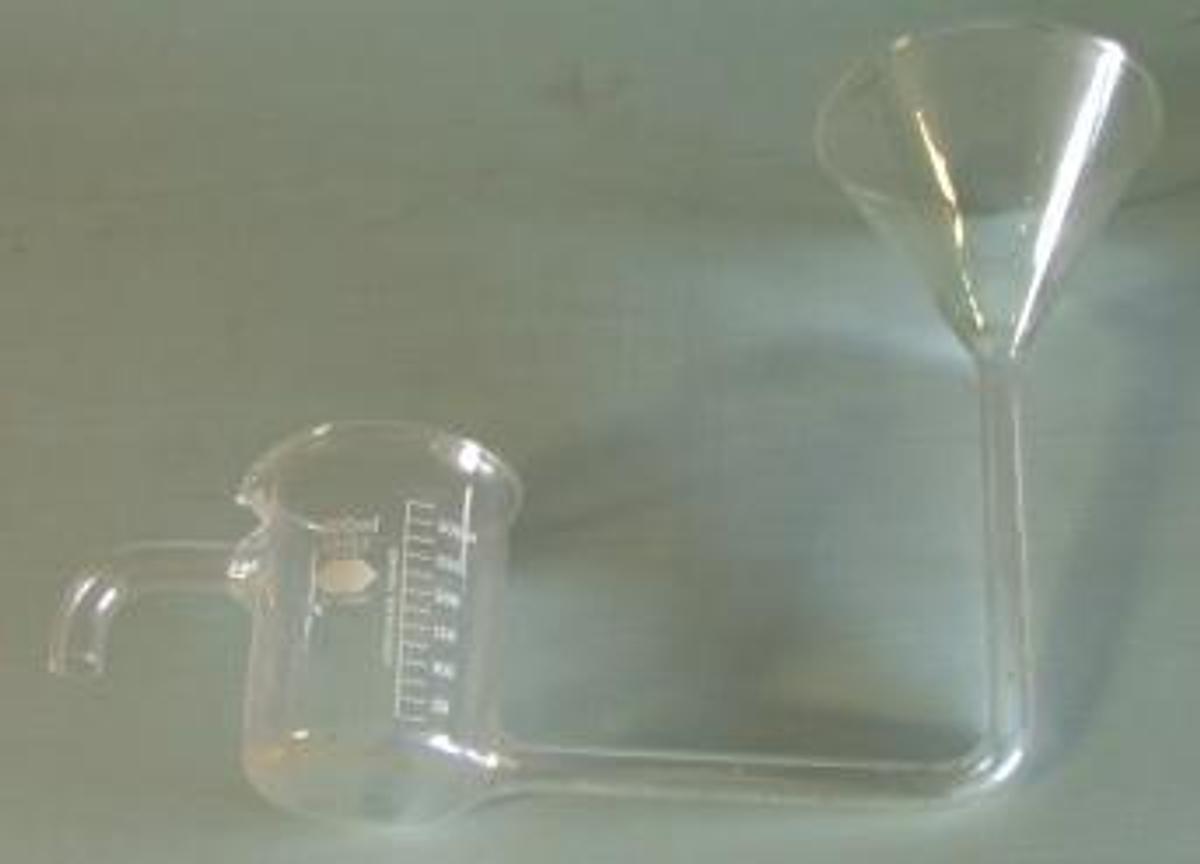 Used QTY. 1. KIMAX NO. 14000 GRADUATED BEAKER WITH SPOUT AT 250 ML AND FUNNEL AT 50 ML EXTENDING UP SPECIALTY GLASS
