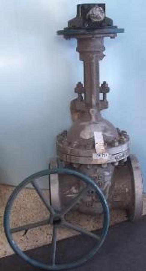 Used QTY. 1. DSI 6" 300 FLANGED RAISED FACE WCB GATE VALVE. 6-300 WCB B 71869-986. WITH MANUAL GEAR OPERATOR.