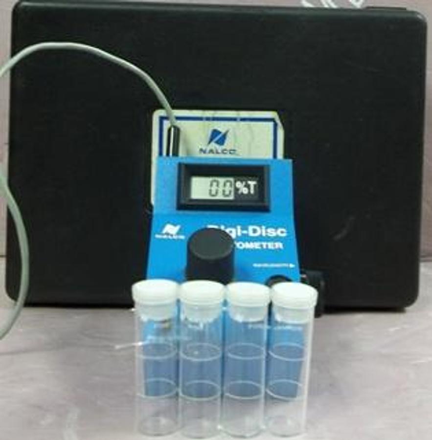 Used QTY. 1. NALCO DIGI DISC PHOTOMETER CO500 BUFFERED COMPUTER OUTPUT REGULATED AC ADAPTER SRN:2077 INCLUDES 4. NALCO P1318 25ML GLASS SAMPLE TUBES 1. FOAM LINED NALCO BLACK PLASTIC CARRY CASE.