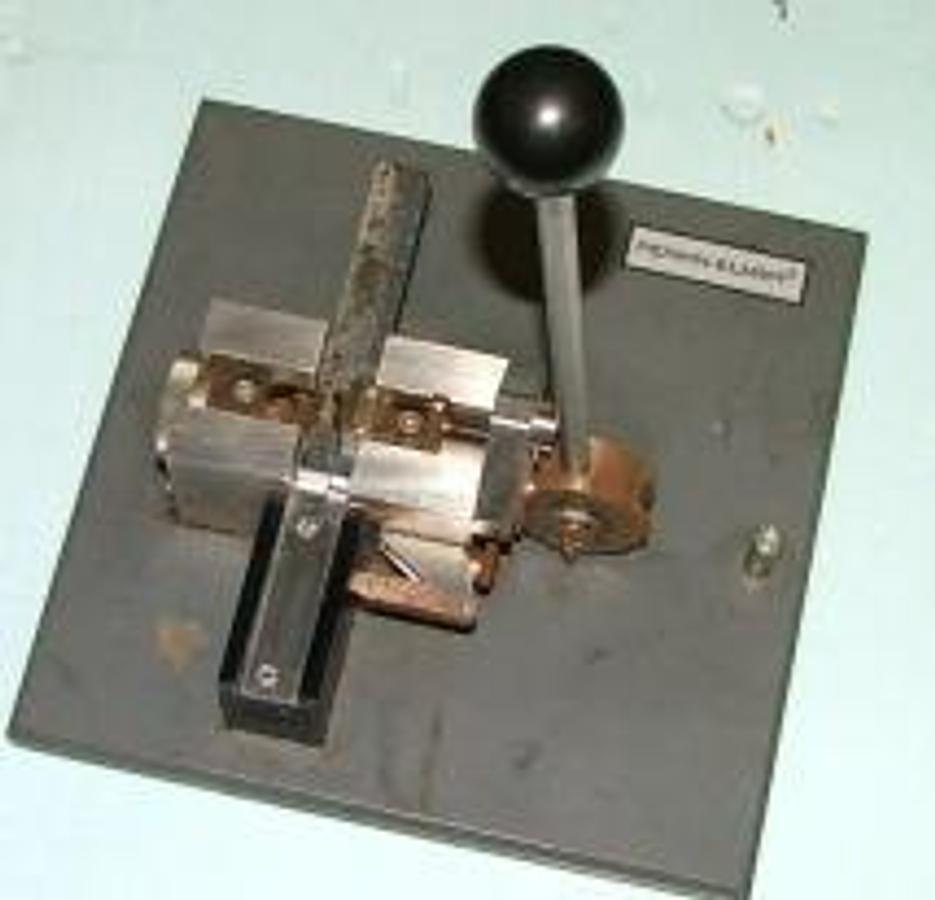 Used PERKIN-ELMER MANUAL SAMPLE CUTTER.