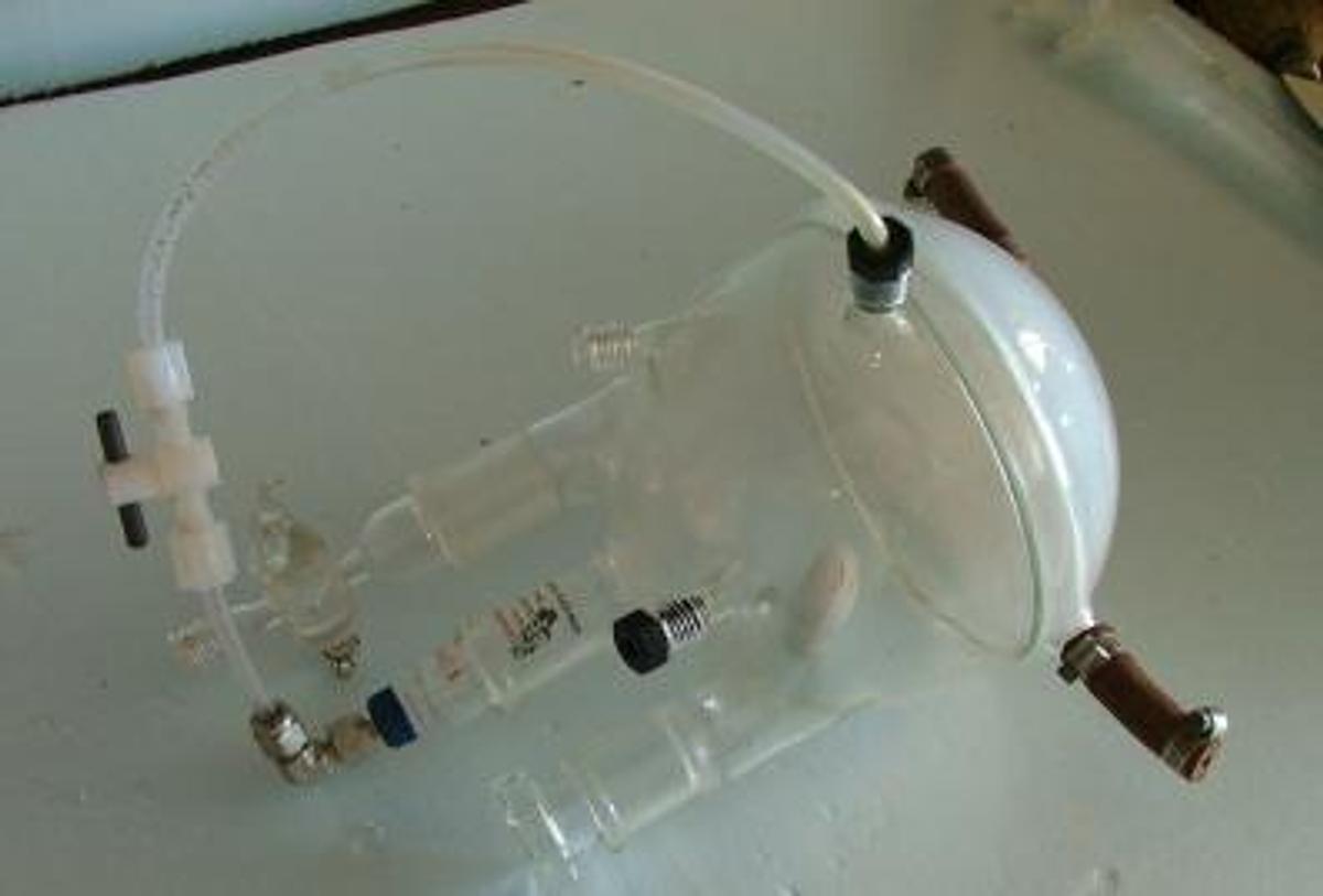 Used SPECIAL 29/42 THREE NECK ROUND BOTTOM BOILING FLASK WITH BUILT IN STIRRING BAR.